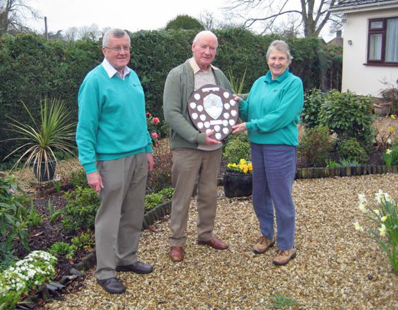Richard Nunn, Chairman, Wimborne in Bloom, Brian Barraclough, with the winning trophy and Mary Allen